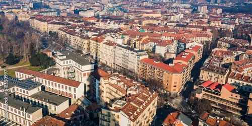 Wall Mural Aerial view of Turin from the top of Mole Antonelliana, the shadow of the building is projected on the cit