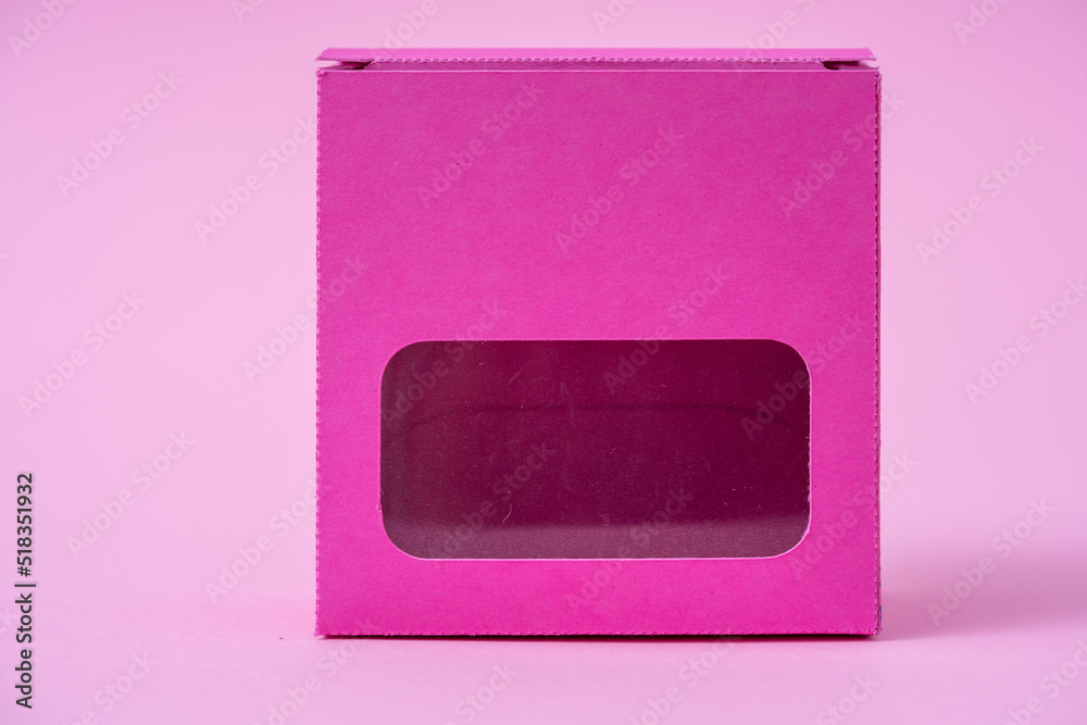 Pink gift box on a pink background Pink gift box on a pink background