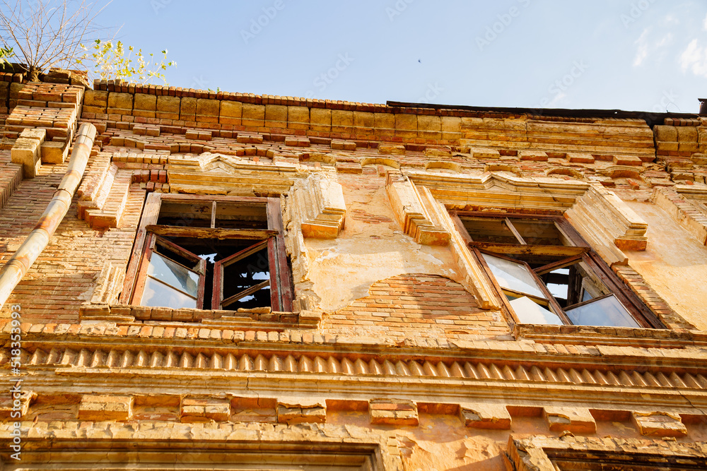 Fototapeta premium ruins. an old ruined building. broken glass in the windows.
