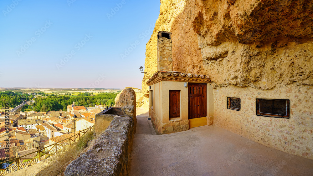 Houses built within the mountain rock at the top of the hill, San Esteban de Gormaz, Soria.