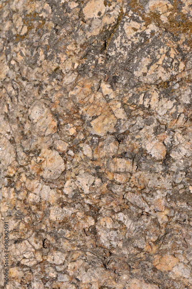 closeup the old and big yellow brown stone soft focus natural brown background. closeup the old and big yellow brown stone soft focus natural brown background.