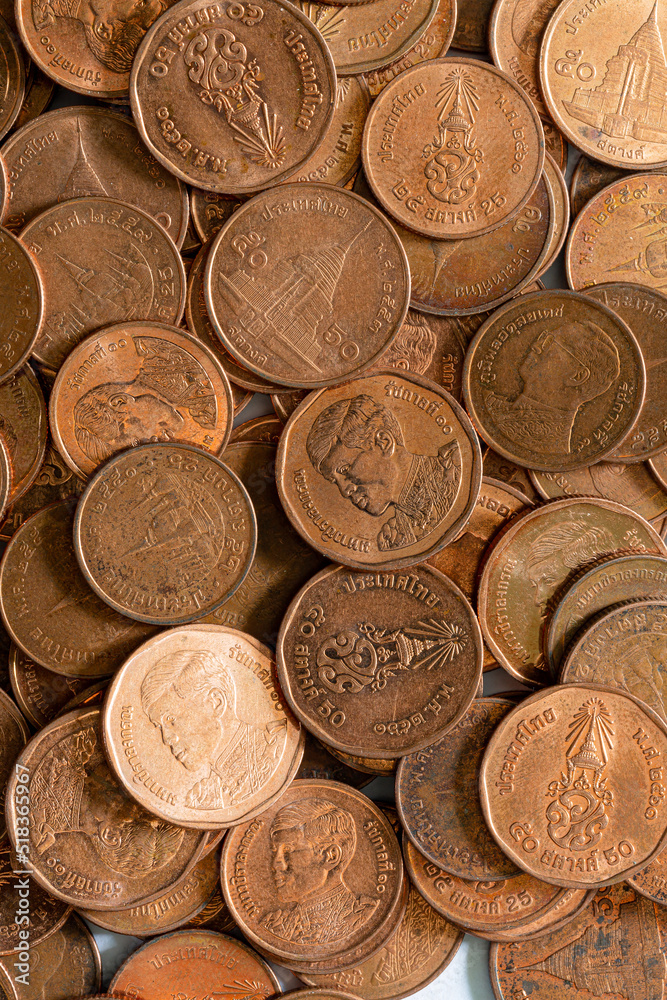 Macro baht coin,Macro coin,Double Exposure of Coins ,Piles of coins on the table. Coins macro shot,Money thai coins background. Various coins used in Thailand Macro baht coin,Macro coin,Double Exposure of Coins ,Piles of coins on the table. Coins macro shot,Money thai coins background. Various coins used in Thailand