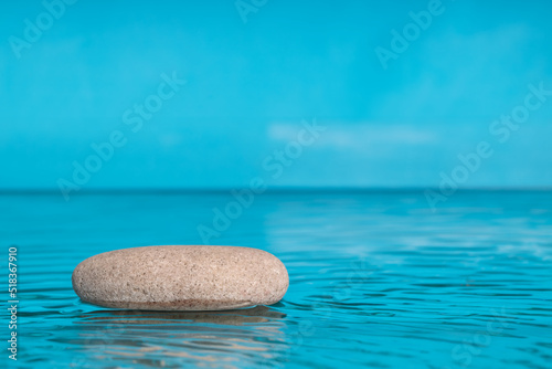 Balanced zen stones in water, mimalistic scene. Copspace