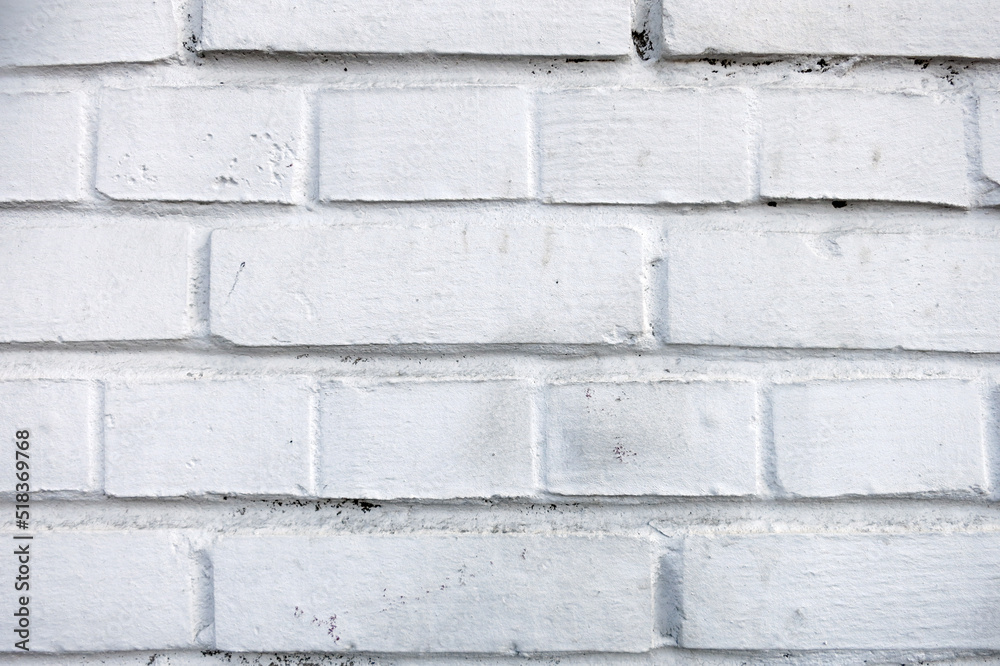 Fototapeta premium Background with the texture of a brick white wall