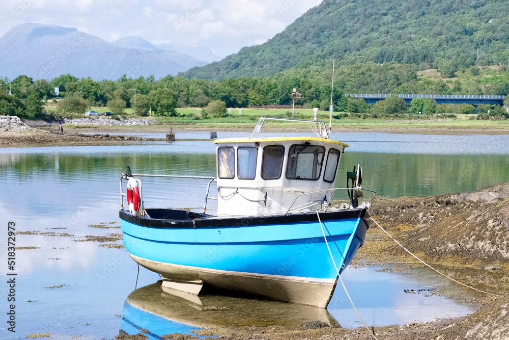 Old boat derelict on River Leven in Dumbarton Old boat derelict on River Leven in Dumbarton