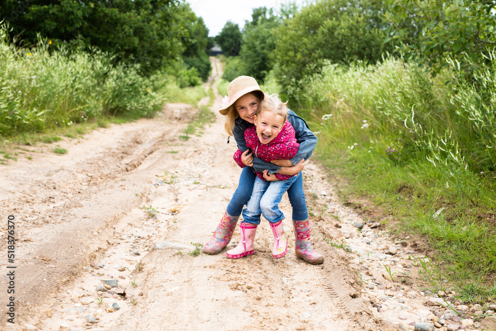 Smiling little girls child in dress outdoor in summer day Smiling little girls child in dress outdoor in summer day