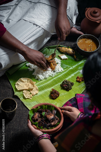 South Indian Meals served on a banana leaf photo