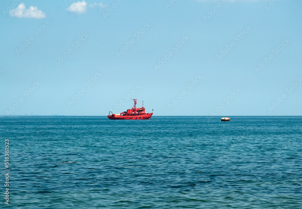 A fire tug sails along the Black Sea.