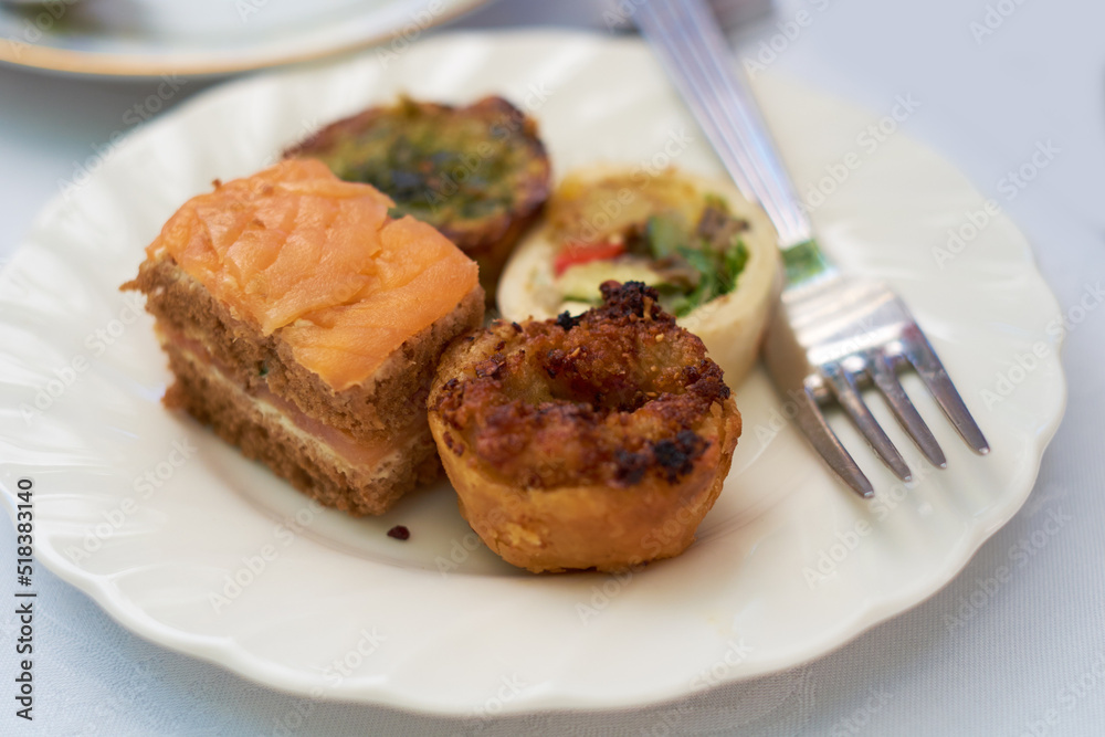 Top view of a delicious plate of food on a table during lunch or dinner at home. Healthy and fresh gourmet meal made at a restaurant. Light snacks dished on a plate at an event or party on a counter Top view of a delicious plate of food on a table during lunch or dinner at home. Healthy and fresh gourmet meal made at a restaurant. Light snacks dished on a plate at an event or party on a counter