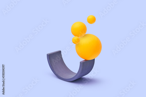 Arched plank holding balls photo