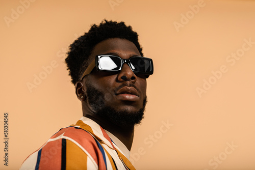 Black man with sunglasses summer portrait photo