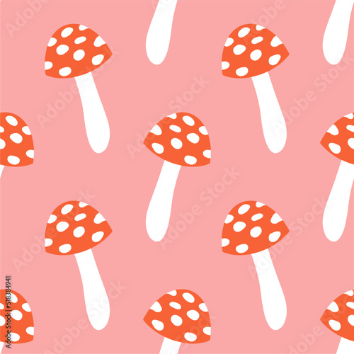 Mushrooms seamless pattern. Fly agaric texture design for textile, wrapping paper. Magic wonderful mushroom background. Vector illustration on a pink background.