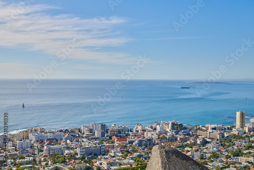 Panorama of Cape Town, South African on bright morning with copy space. Outdoor fresh air with ocean view and cityscape of a busy town in Western Cape, remote getaway destinations in a beautiful city