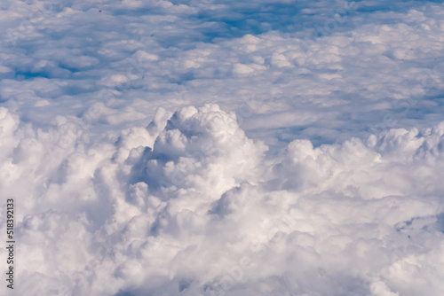 Fototapeta Naklejka Na Ścianę i Meble -  Clouds outside my airplane window from a comfortable cruising altitude 