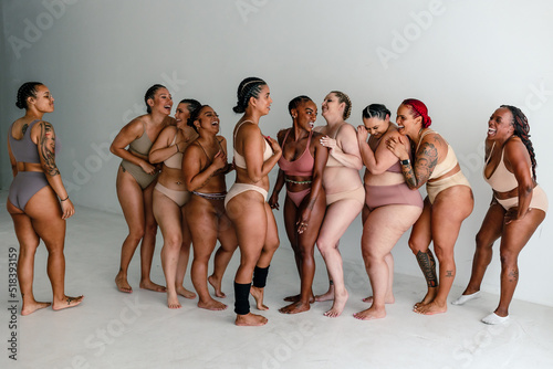 Ten happy women in underwear photo