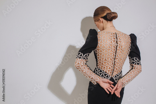 Anonymous woman in beautiful evening dress