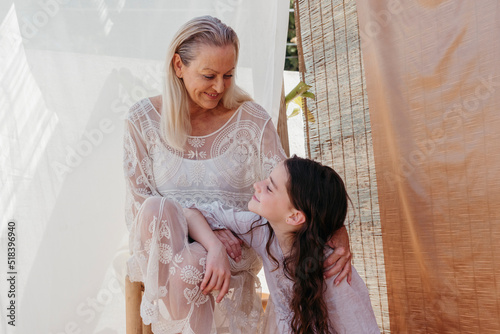 Happy grandmother and granddaughter love photo