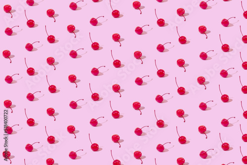 Festive pattern of sweet red maraschino cherries photo