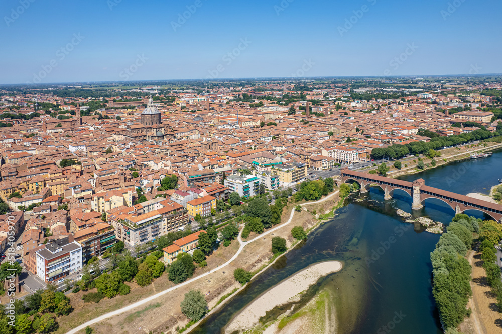 Aerial view of Pavia and the Ticino River, View of the Cathedral of Pavia, Covered Bridge. Lombardia, Italy