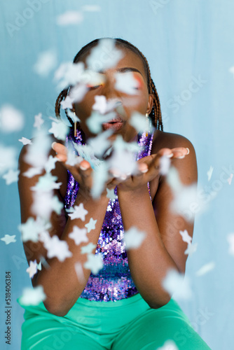 A woman with confetti photo