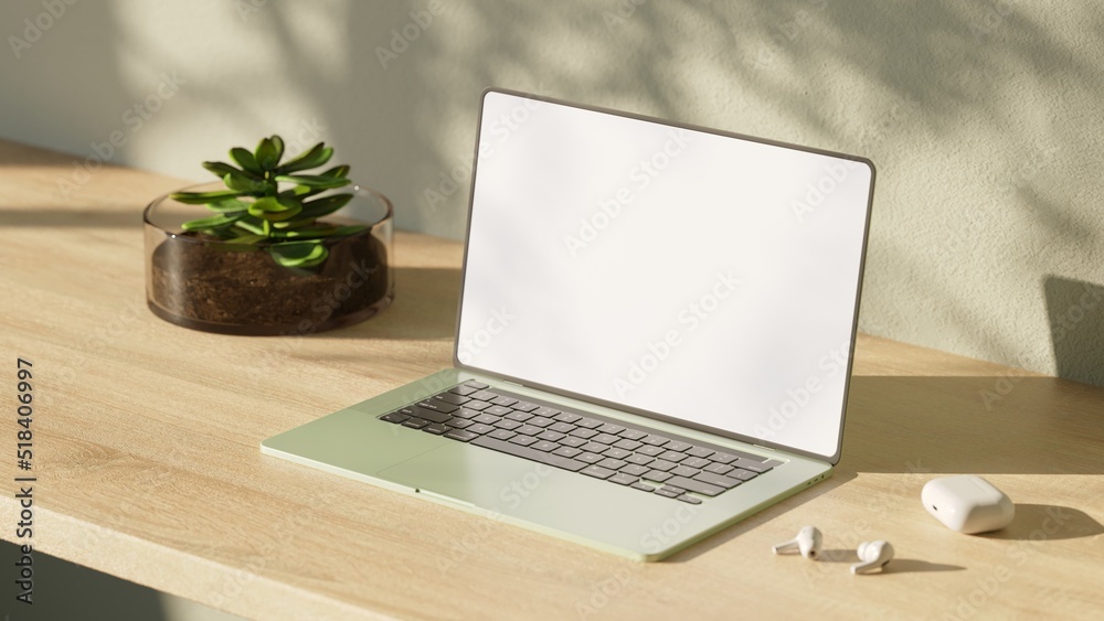 Laptop with blank screen on wood table. Aesthetic workplace. Laptop with blank screen on wood table. Aesthetic workplace.