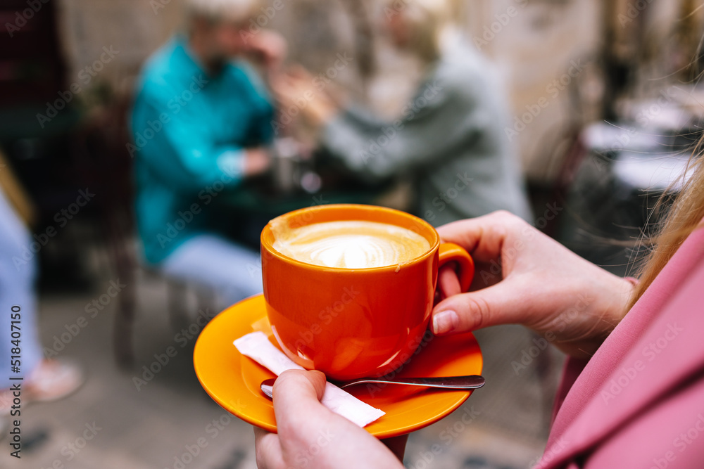 Unrecognizable client having cup of tasty coffee Unrecognizable client having cup of tasty coffee