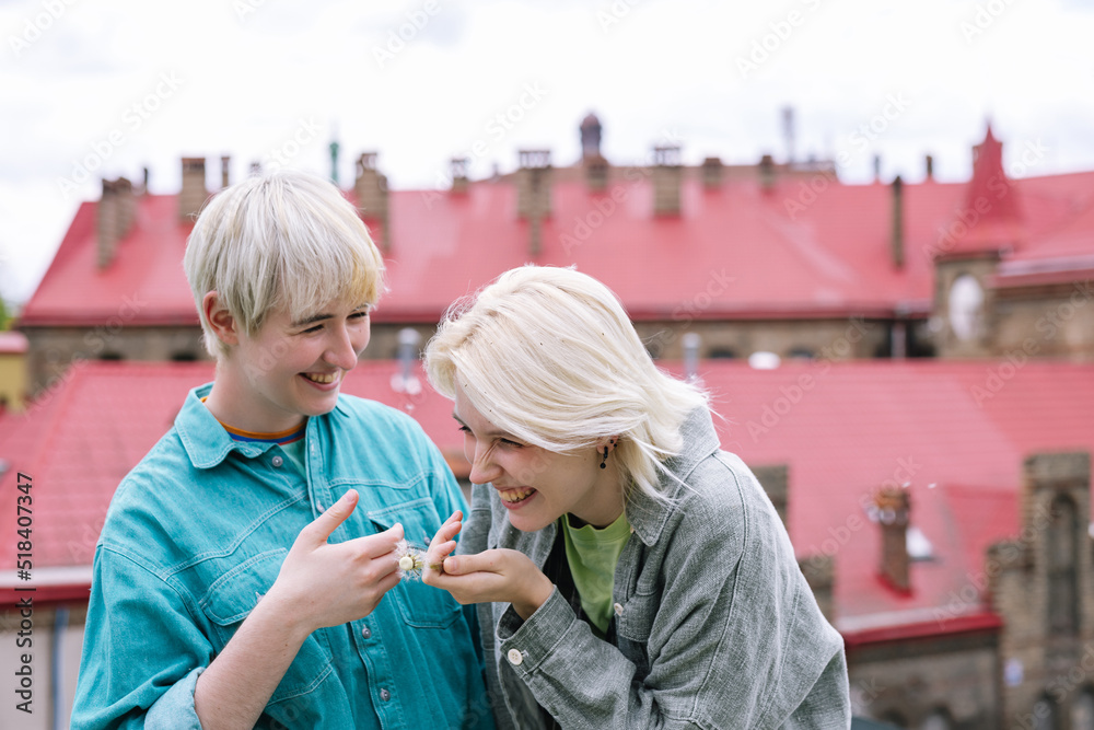 Woman with her girlfriend feeling happy about vacation Woman with her girlfriend feeling happy about vacation