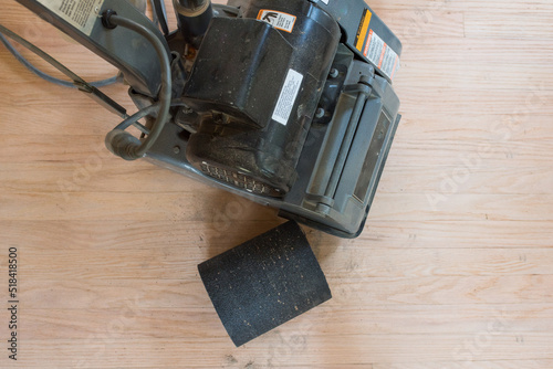 Floor sander and sand paper roll