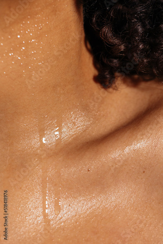 Trickles of sweat on neck