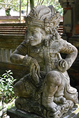 Deva Temple Guardian Statue Facing Left, Tirta Empul, Bali © Globepouncing