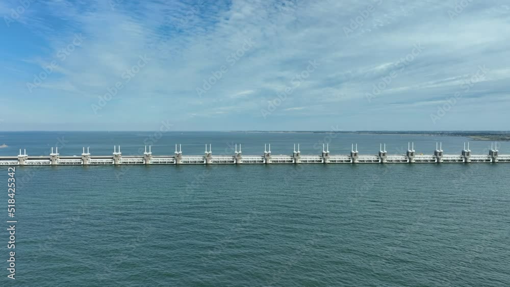 Storm Surge Barrier in Eastern Scheldt Protecting the Netherlands from the Sea Storm Surge Barrier in Eastern Scheldt Protecting the Netherlands from the Sea