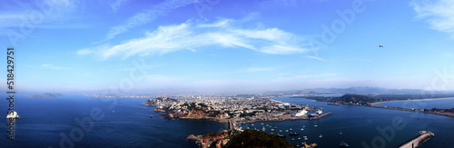 180 panoramic aereal picture of island with big city in mazatlan with soft light at the morning 