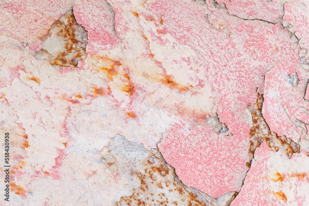 Naklejka premium Old peeling weathered outdated paint pink abstract pattern wall texture background
