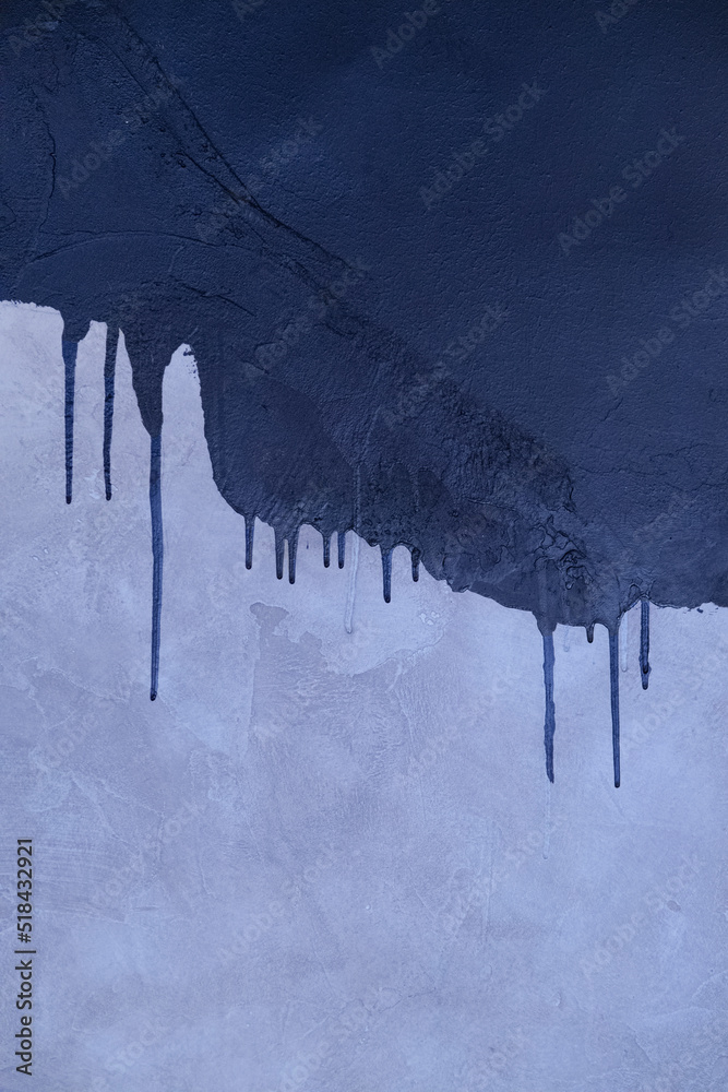 © Sonja Lekovic/Stocksy - blue paint dripping over pastel violet wall © Sonja Lekovic/Stocksy - blue paint dripping over pastel violet wall