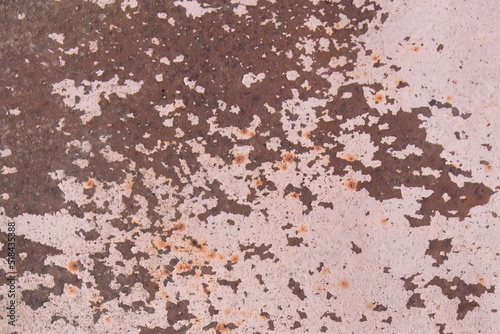 Light pink paint peeling off from the surface of the old metallic texture grunge steel background obsolete messy © Andrey