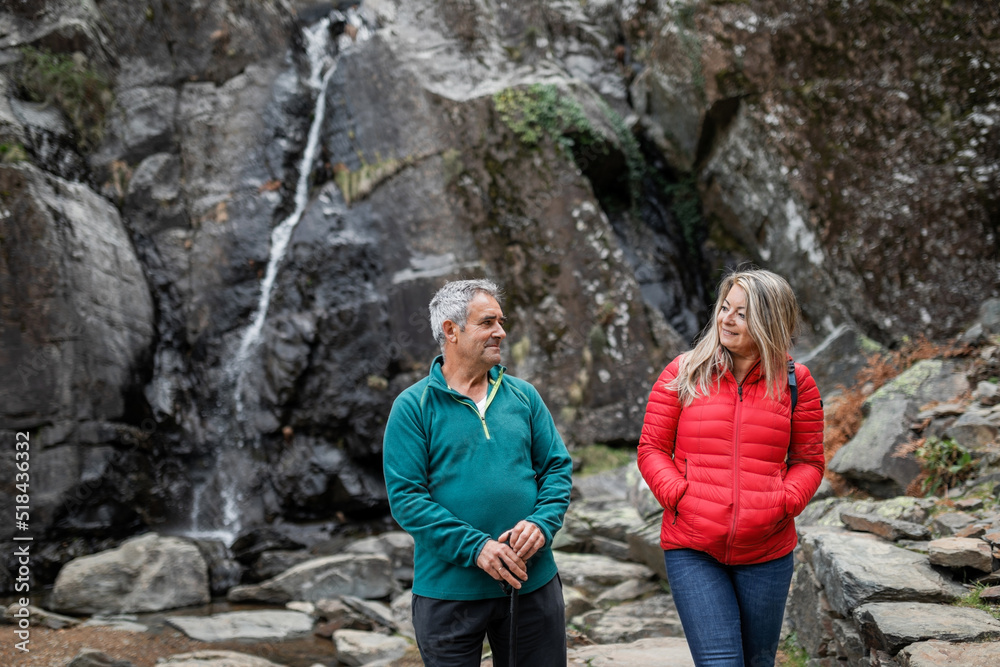 mature couple of hikers on the mountain mature couple of hikers on the mountain