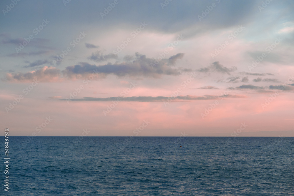 dramatic color of a sunset sky over the sea dramatic color of a sunset sky over the sea