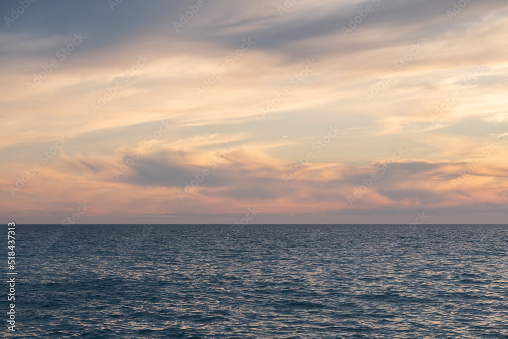 dramatic color of a sunset sky over the sea dramatic color of a sunset sky over the sea