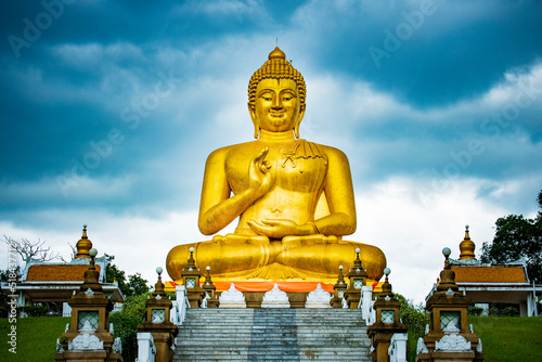 The big golden Buddha statue of Thaksin Mingmongkol, Narathiwat province, Thailand. © sippakorn
