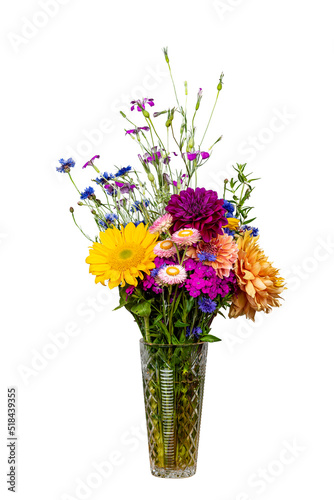 Beautiful bouquet of vibrant colored fresh flowers in a crystal vase isolated on white with a shallow depth of field © clsdesign