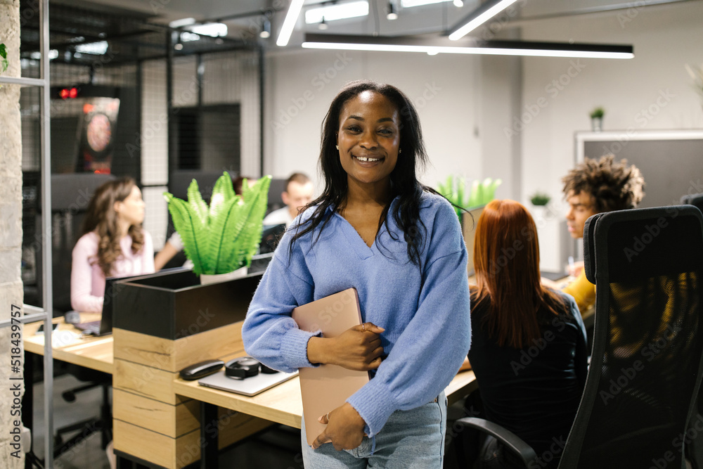 Afro-American Businesswoman Holding A Laptop Afro-American Businesswoman Holding A Laptop