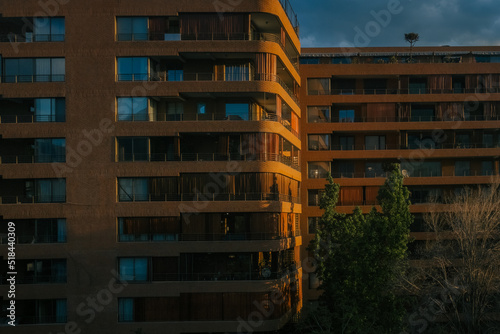 Apartment building at sunset photo