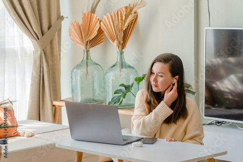 Entrepreneur airpods laptop photo