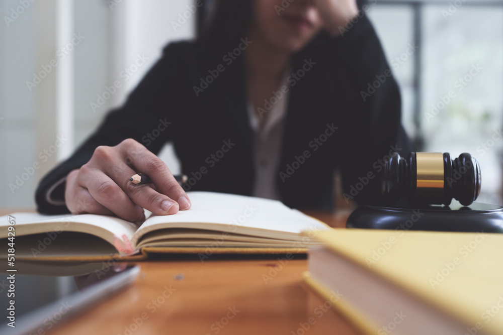 Close up lawyer business woman working or reading agreement contract in office workplace for consultant lawyer concept. Close up lawyer business woman working or reading agreement contract in office workplace for consultant lawyer concept.