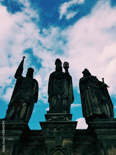 Three Statues under the blue sky in Prague Czech Republic photo
