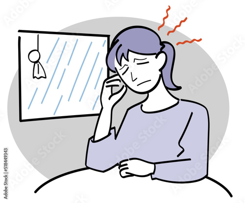 雨の日で憂鬱になっている女性