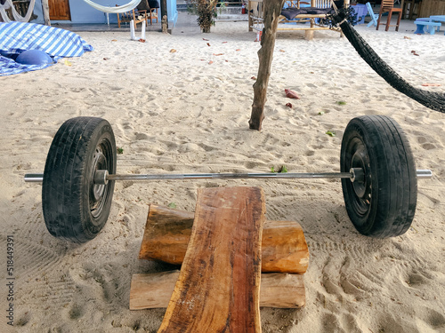 UGC, sand and barbel with car tires as weigh photo