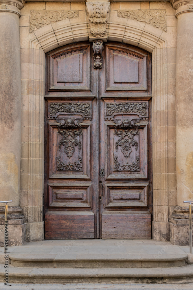 old wooden door in a church old wooden door in a church