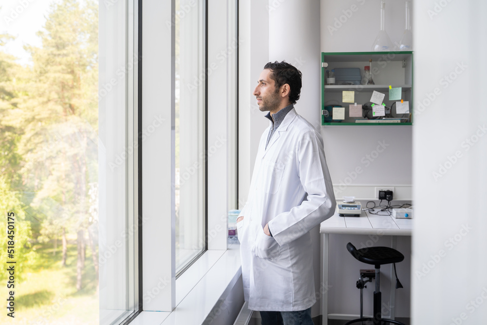 Man Looking Through The Lab Window Man Looking Through The Lab Window