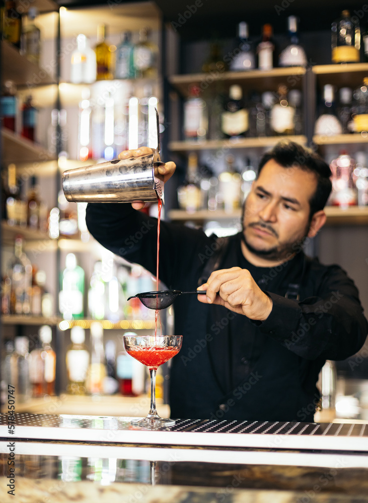 Bartender making cocktails at work Bartender making cocktails at work